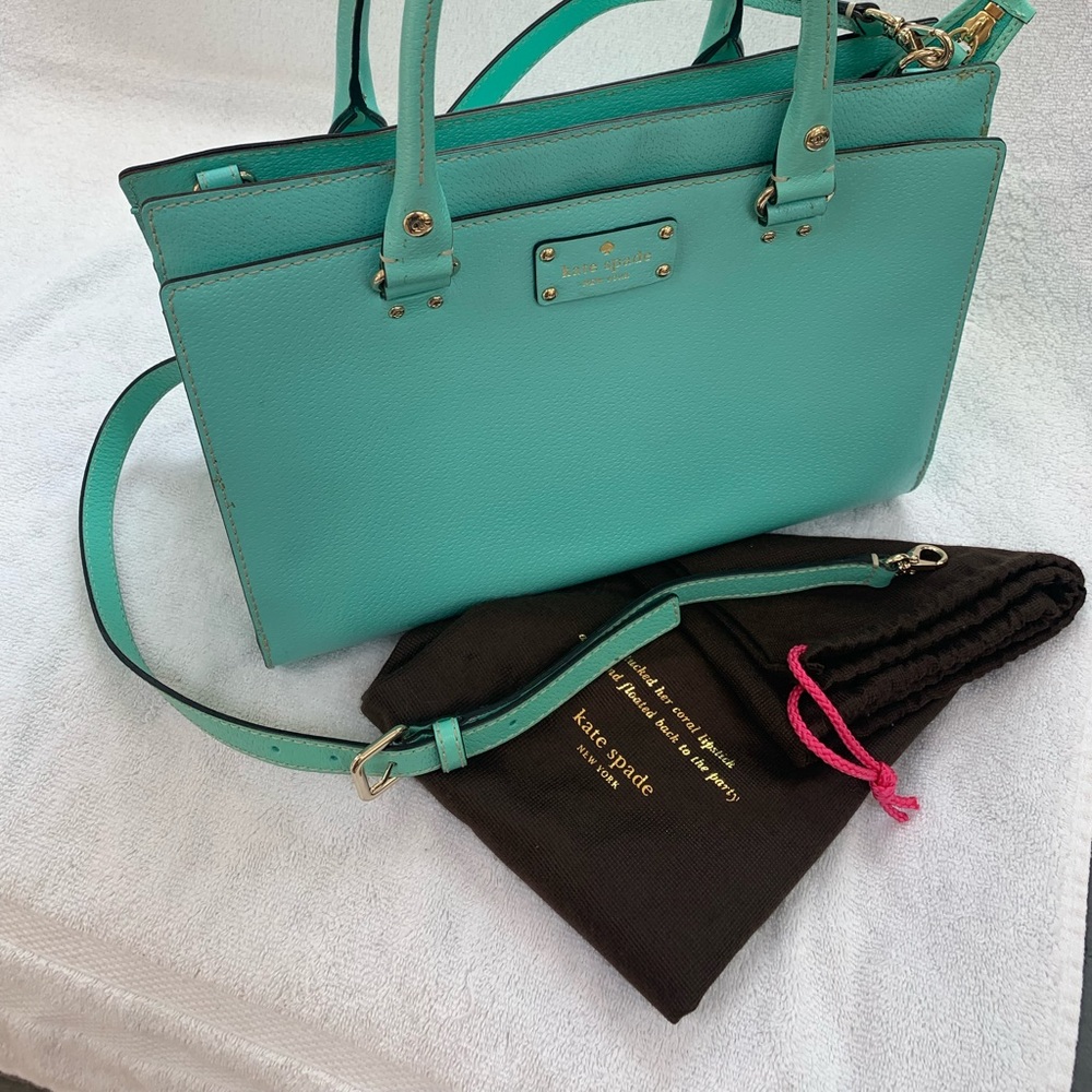 Kate Spade Satchel handbag with adjustable shoulder strap. Mint-gold hardware